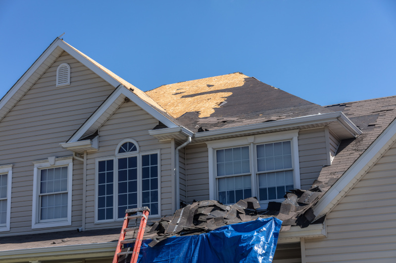 ladder up to roof for repairing and roof replacement in Monticello, Indiana; roof replacement in Frankfort, Indiana; roof replacement in Kokomo, Indiana; roof replacement in Mishawaka, Indiana; roof replacement in South Bend, Indiana