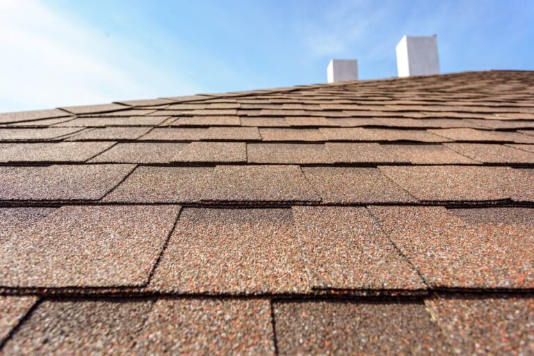 close up brown asphalt shingles