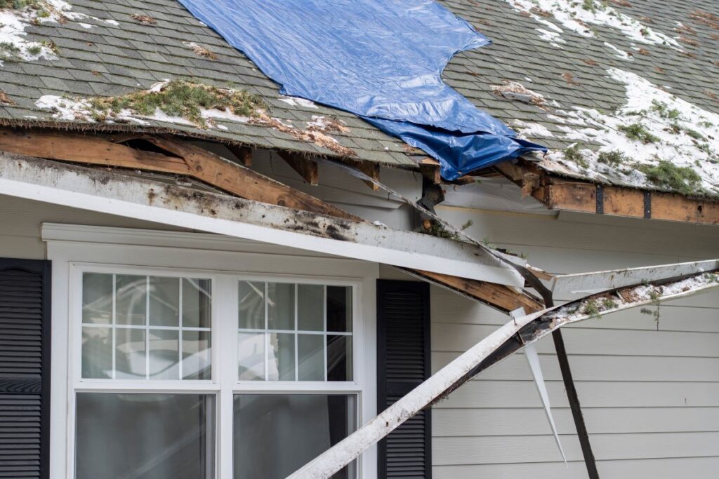 damaged roof after snow storm