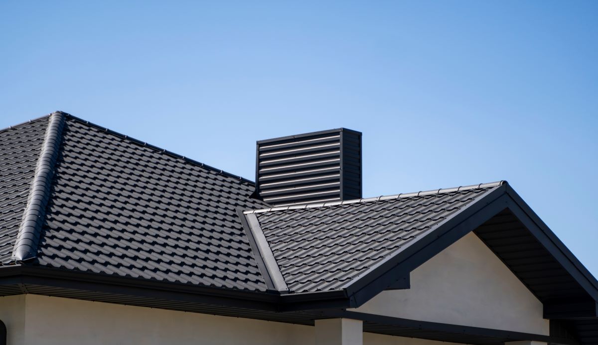 metal tile roof against blue sky