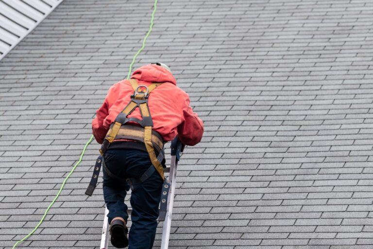 roofer on a ladder