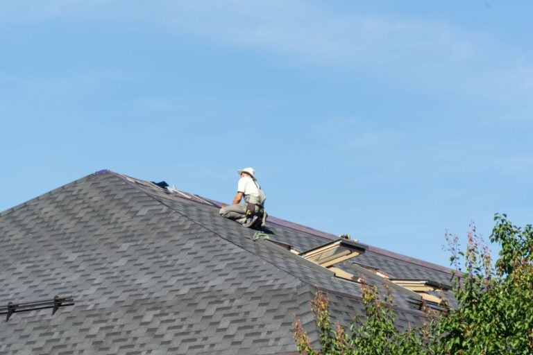 roofer sitting on roof