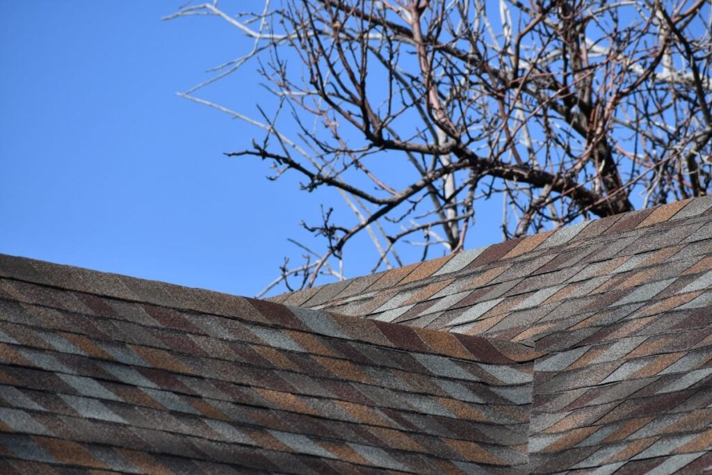 3 tab vs architectural shingles brown red and white roof