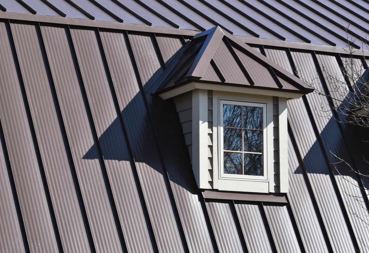 how much does a steel roof cost brown house white window