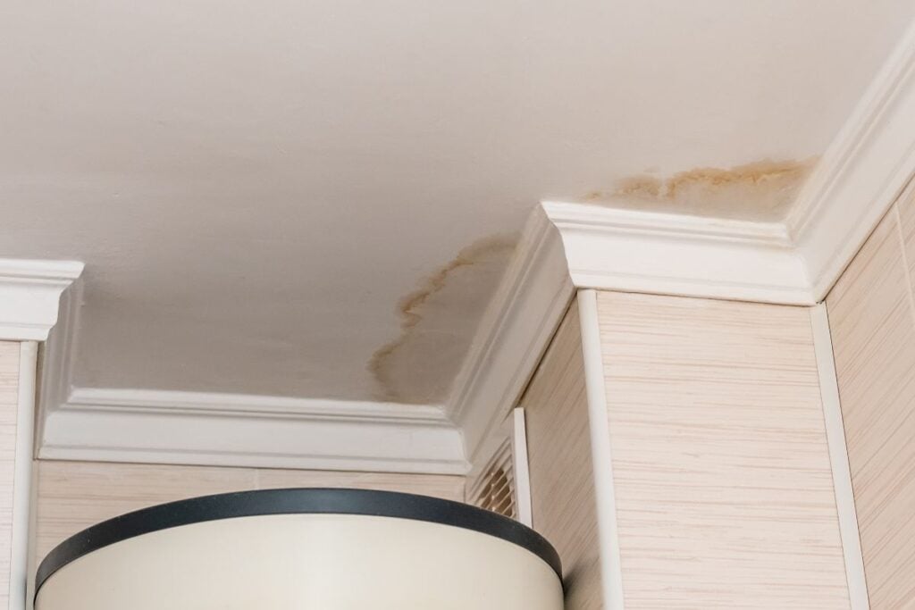 how to find a roof leak yellow stain on the white ceiling