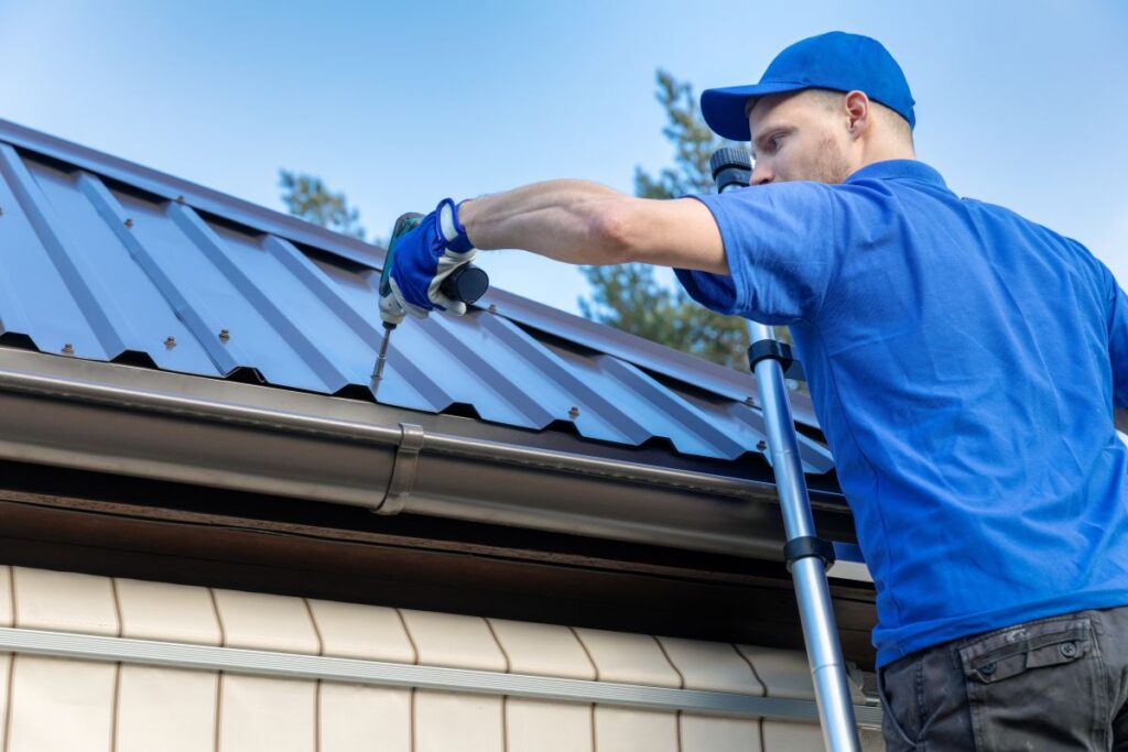 metal roof maintenance worker using blue shirt adjusting