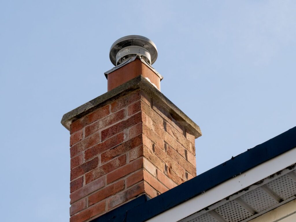 chimney rain cap light blue roof