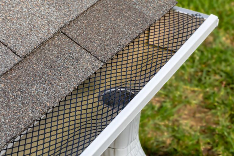do gutter guards work black and white water system shingles roof