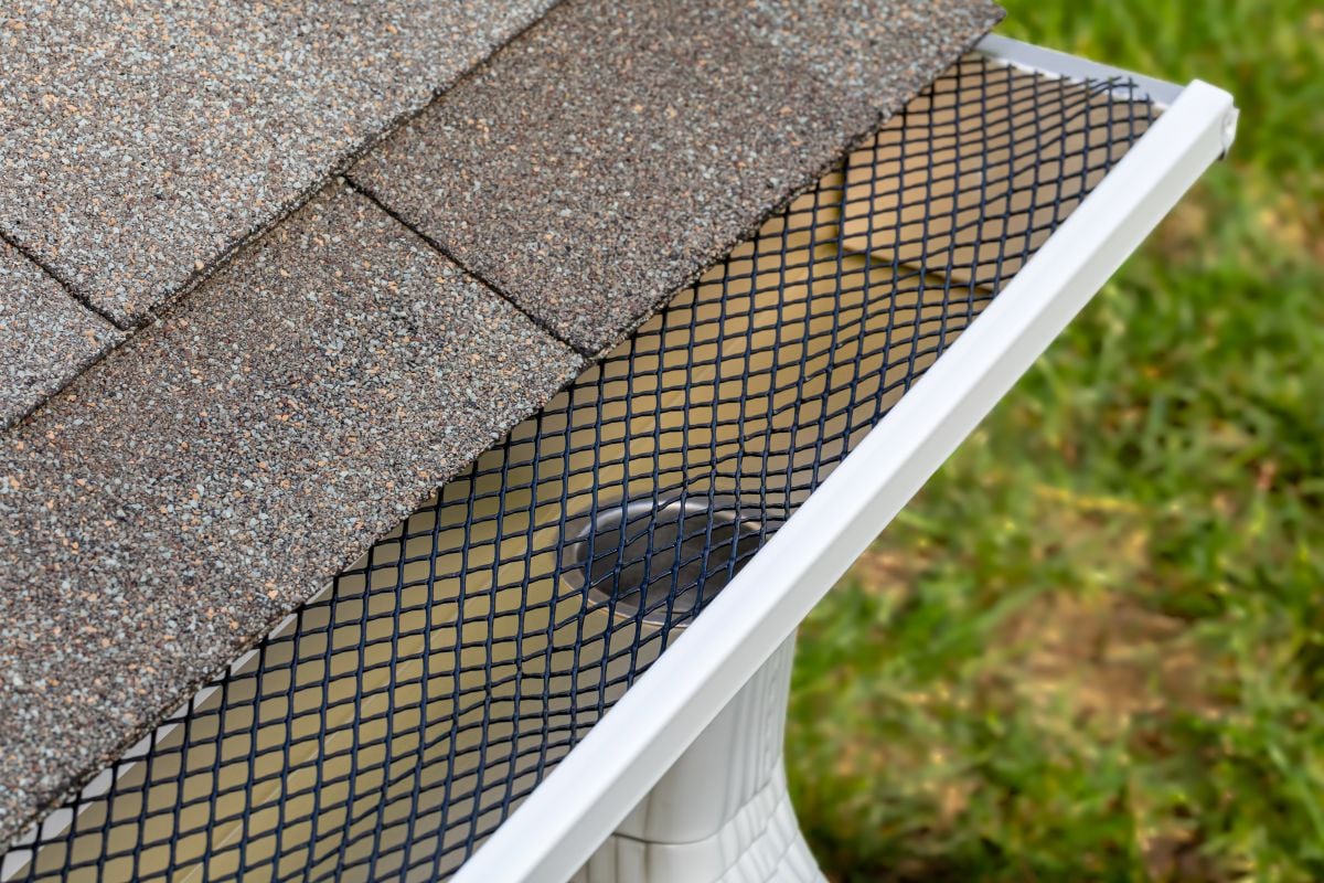 do gutter guards work black and white water system shingles roof