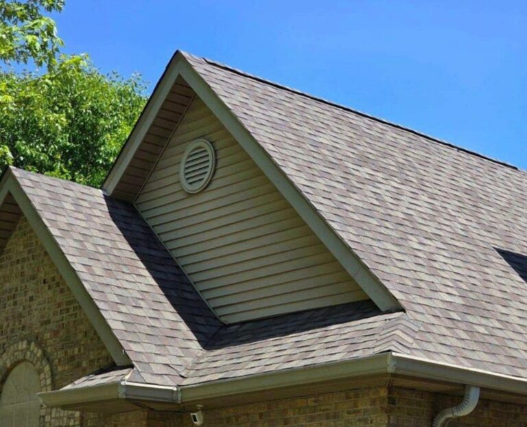 a roof with a shingle roof