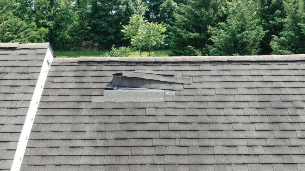 Aerial Drone Close Up of Roof Damage, Missing Shingles