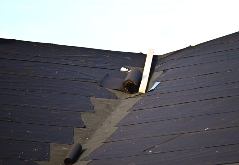 roof underlayment being installed