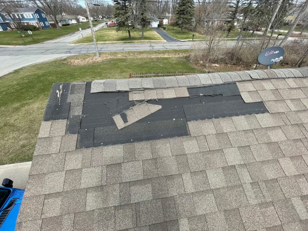 hail damage roof repair shingles roof missing leaving black hole