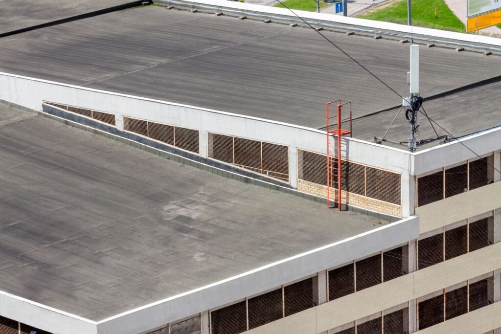commercial flat roof repair black asphalt