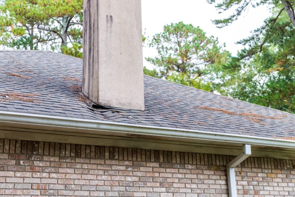 does homeowners insurance cover roof leaks shingles sinked after heavy rain