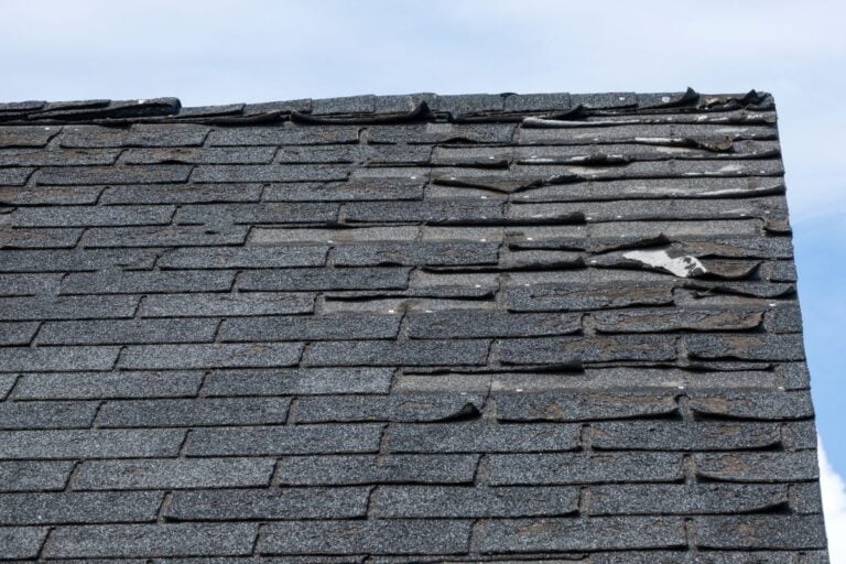 damaged shingles old roof shingle falling