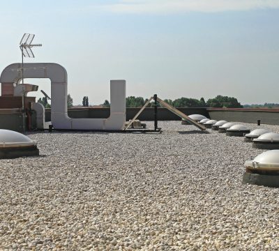 Gravel Flat Roof commercial roofing; preventing commercial roofing problems