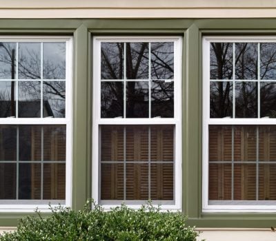 New white with green trim vinyl replacement windows. Horizontal. window replacement & window installation services